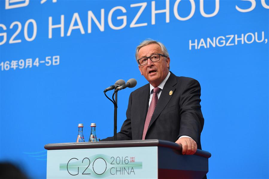 European Commission President Jean-Claude Juncker (R) speaks during the EU Delegation press conference of the G20 Summit in Hangzhou, capital of east China's Zhejiang Province, Sept. 4, 2016. (Xinhua/Li He) 