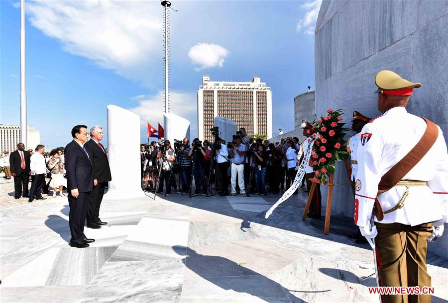 Chinese Premier Li Keqiang lays a wreath to the monument of Jose Marti, a Cuban national hero, in Havana, Cuba, Sept. 24, 2016.