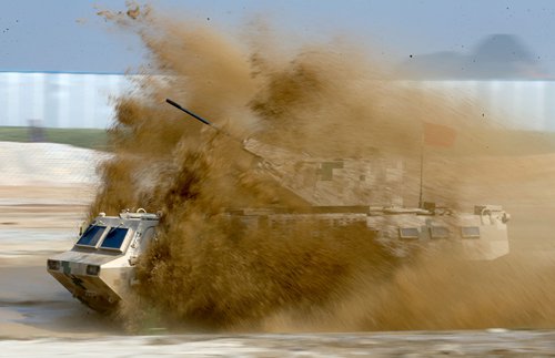 China North Industries Group Corporation demonstrates the CS/VN9 6x6 Wheeled Armored Vehicle on Thursday at the Airshow China 2016, in Zhuhai, South China's Guangdong Province. Photo by Cui Meng