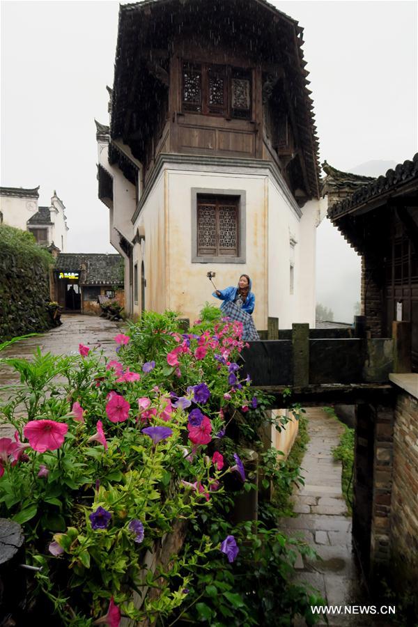 Photo taken on Nov. 13, 2016 shows the Hui-style architecture in Wuyuan County, east China's Jiangxi Province.