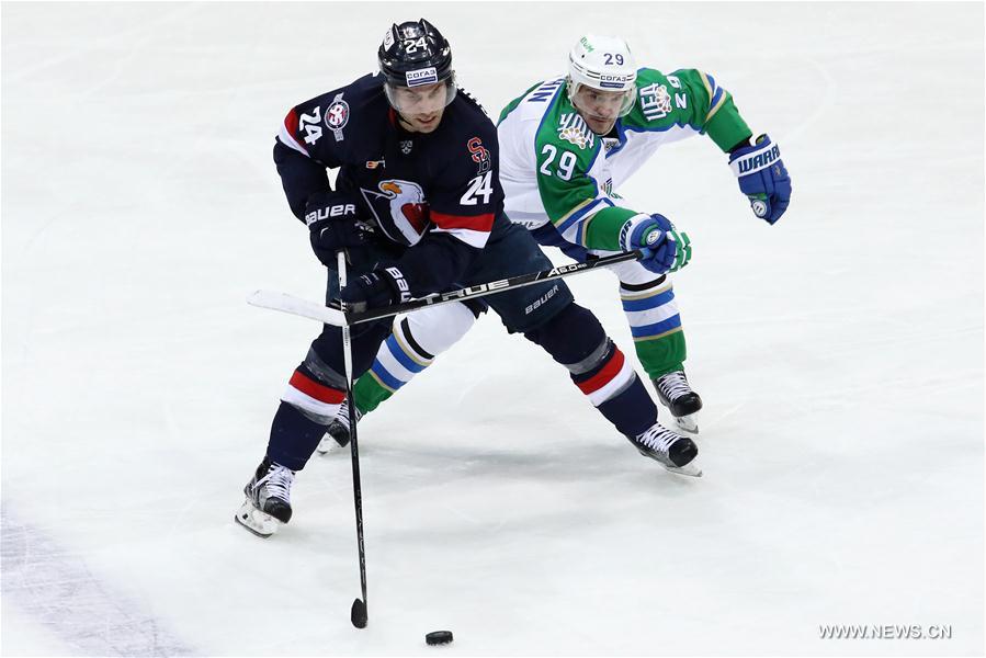 Players of HC Slovan Bratislava celebrate after scoring against Salavat Julajev Ufa during the Kontinental Hockey League (KHL) match in Bratislava, Slovakia, on Dec. 20, 2016. 