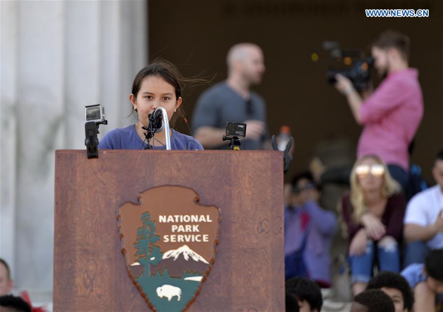 A student of Watkins Elementary School participates in the 13th annual reading of Martin Luther King's 'I Have a Dream' speech event at Lincoln Memorial in Washington D.C., capital of the United States, on Feb. 24, 2017 to commemorate the civil rights leader. 