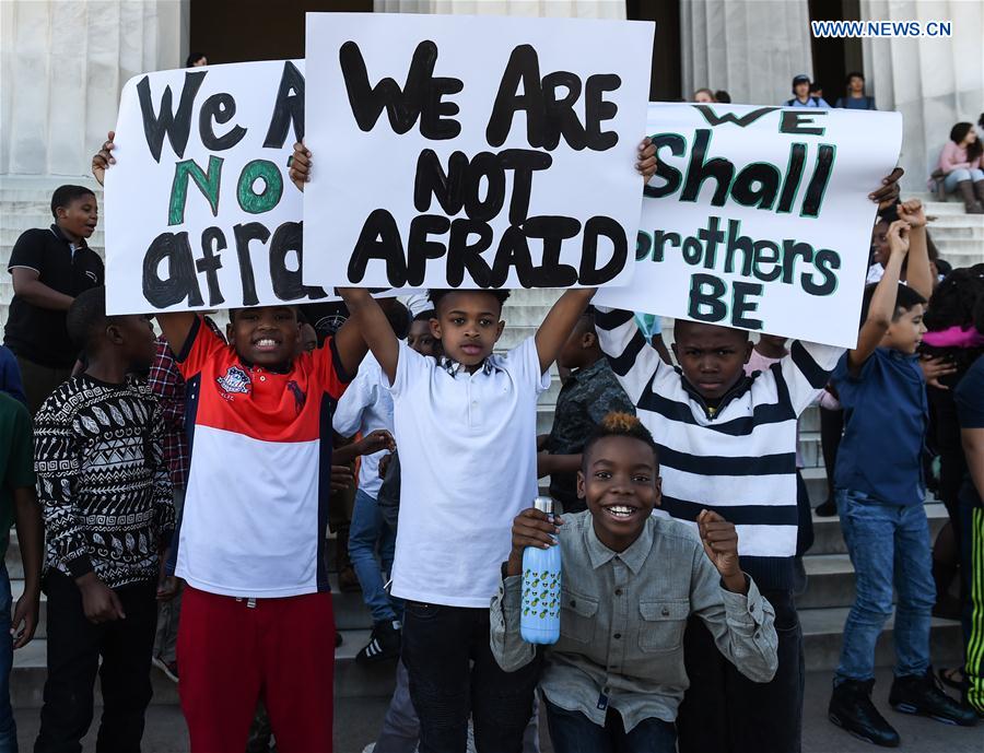 Students of Watkins Elementary School participate in the 13th annual reading of Martin Luther King's 'I Have a Dream' speech event at Lincoln Memorial in Washington D.C., capital of the United States, on Feb. 24, 2017 to commemorate the civil rights leader. 