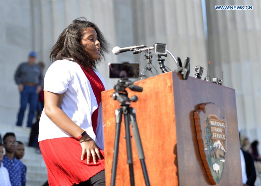 A student of Watkins Elementary School participates in the 13th annual reading of Martin Luther King's 'I Have a Dream' speech event at Lincoln Memorial in Washington D.C., capital of the United States, on Feb. 24, 2017 to commemorate the civil rights leader. 