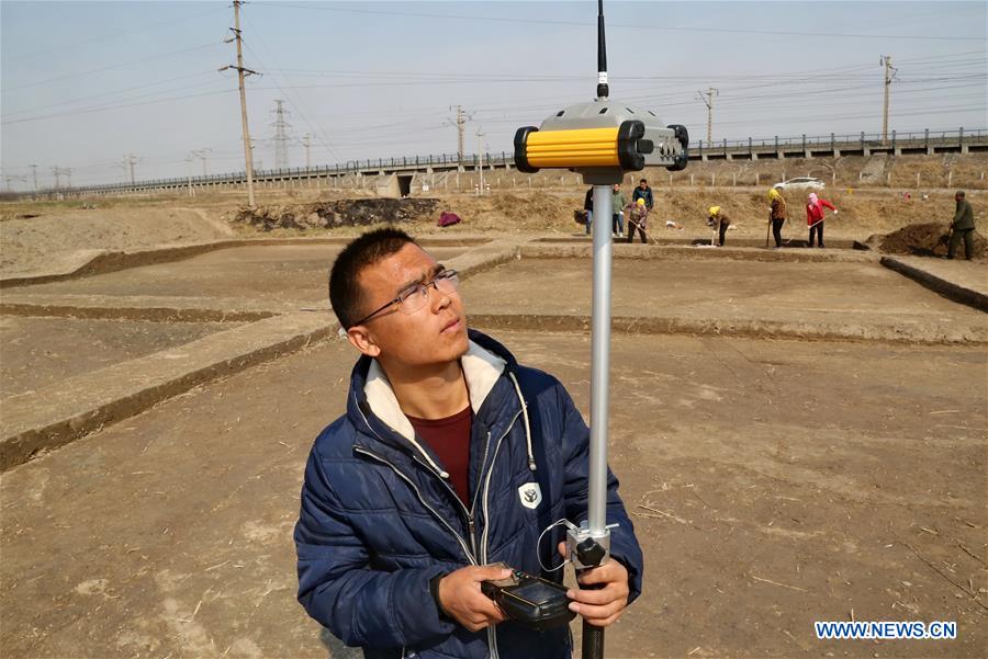 An archaeologist works at the ancient Haifeng town ruins site in Huanghua, north China's Hebei Province, March 17, 2017. Chinese archaeologists began the second-stage excavation of the ruins here, expecting to unveil functions of the town as an important trade port during the Jin (1115-1234) and Yuan (1271-1368) dynasties in Chinese history. (Xinhua/Yang Shiyao)