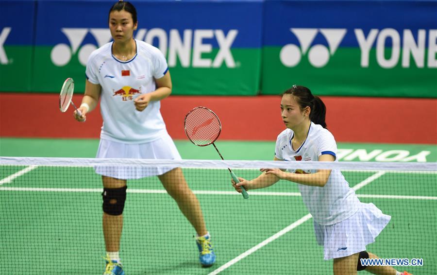 Huang Yaqiong and Tang Jinhua (R) of China compete during the first round of women's double against Chang Ye Na and Lee So Hee of South Korea in Yonex Sunrise Indian Open Badminton Championship in New Delhi, India, March 29, 2017. Huang Yaqiong and Tang Jinhua won 2-0. 