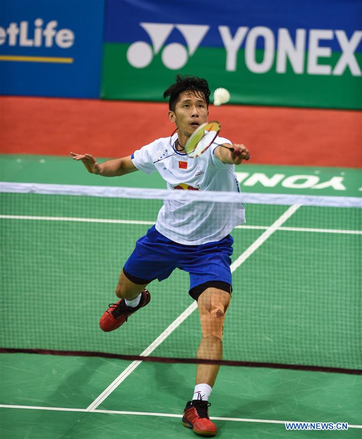 Tian Houwei of China competes during the first round of men's single against Wei Nan of Hong Kong, China in Yonex Sunrise Indian Open Badminton Championship in New Delhi, India, March 29, 2017. Tian Houwei won 2-0.