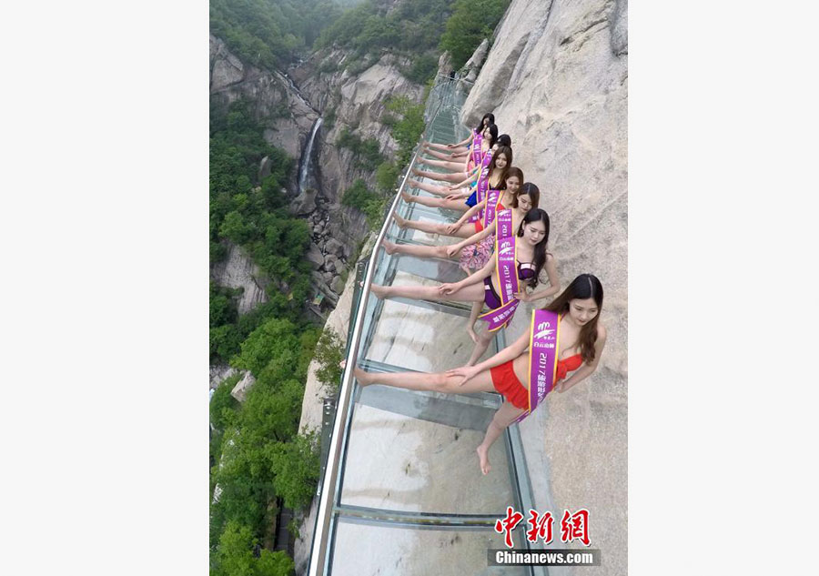 Models catwalk in bikini on 1,000-meter-high mountainside