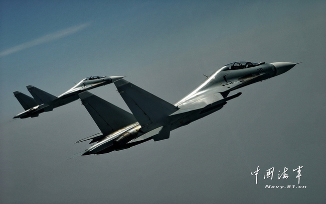 The undated photo shows two Chinese fighter jets flying in formation during a training exercise. [File Photo: navy.81.cn]