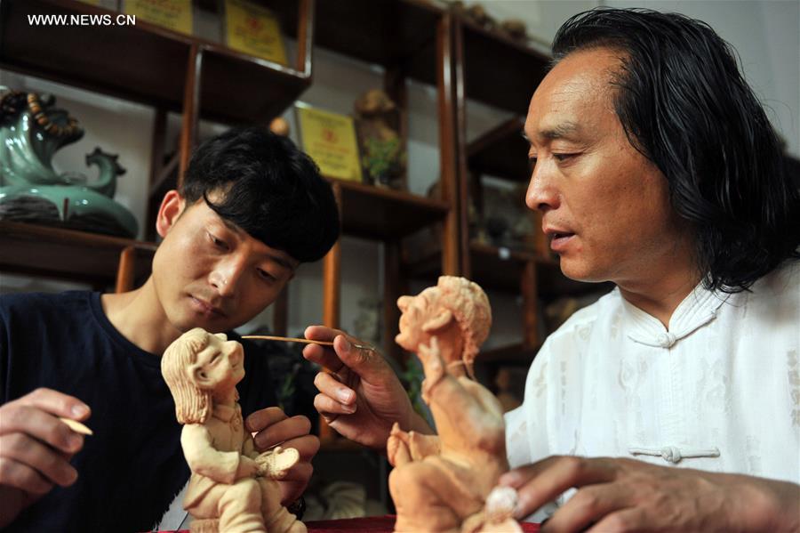 CHINA-GANSU-INTANGIBLE CULTURAL HERITAGE-CLAY SCULPTURE (CN)