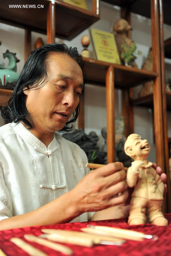 CHINA-GANSU-INTANGIBLE CULTURAL HERITAGE-CLAY SCULPTURE (CN)
