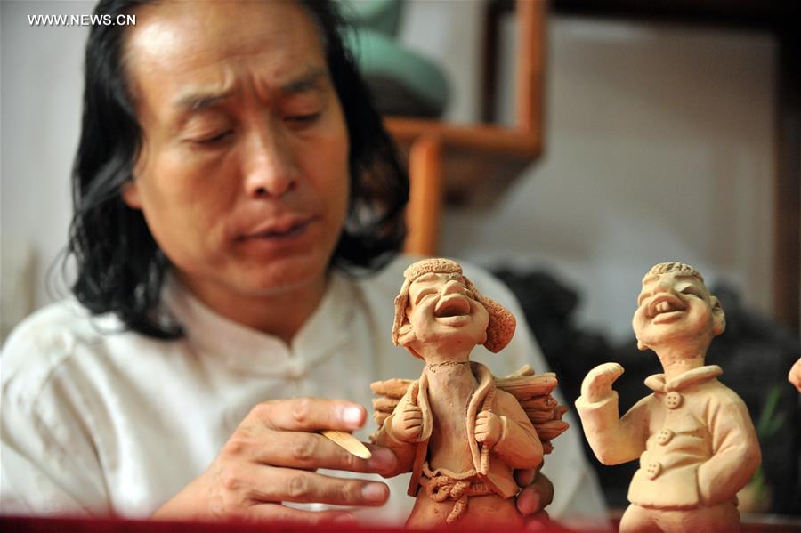 CHINA-GANSU-INTANGIBLE CULTURAL HERITAGE-CLAY SCULPTURE (CN)