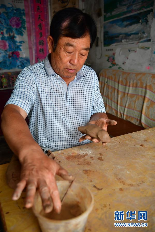 （文化）（4）淮陽泥泥狗：遠古走來的“活化石”