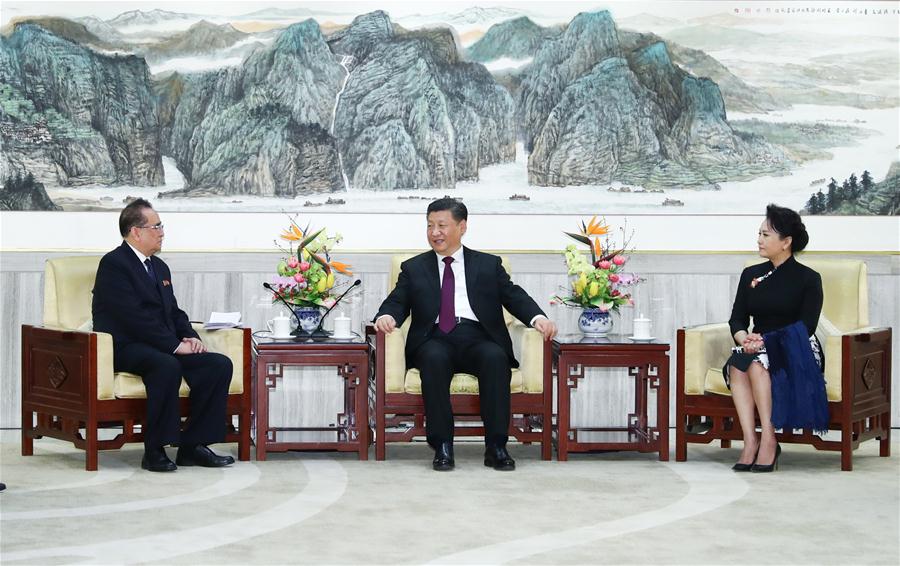 Xi and his wife meet senior DPRK official, watch art performance