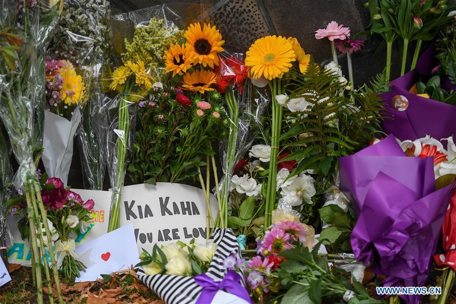 Photo taken on March 16, 2019 shows cards and flowers people placed to mourn the victims of the attacks on two mosques in Christchurch, New Zealand. It was revealed that a 28-year-old Australian man, Brenton Tarrant, conducted terrorist attacks targeting mosques in Christchurch and later was arrested by New Zealand Police. At least 49 people were killed and 48 are hospitalized now. (Xinhua/Guo Lei)