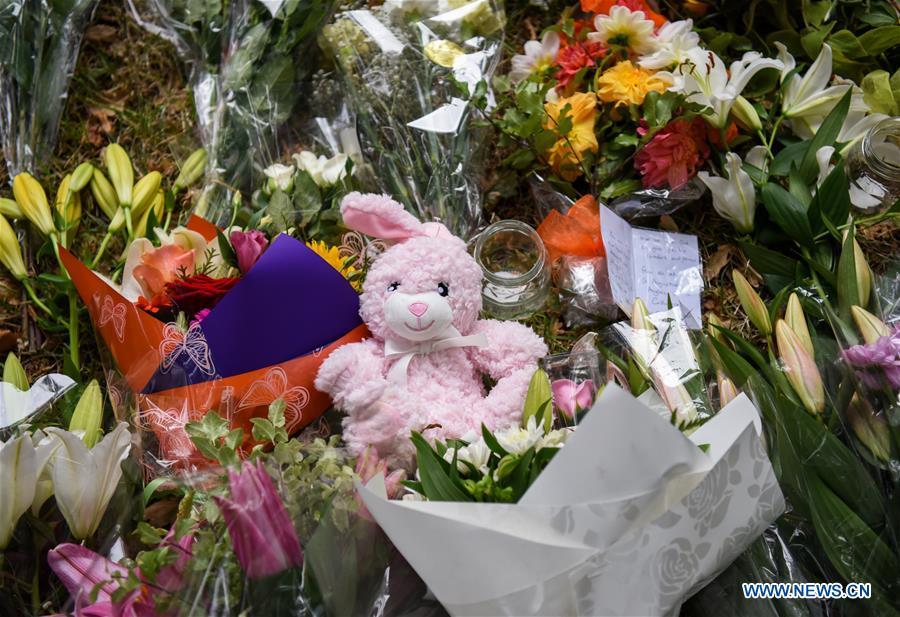 Flowers are placed by people to mourn the victims of the attacks on two mosques in Christchurch, New Zealand, March 16, 2019. (Xinhua/Guo Lei)