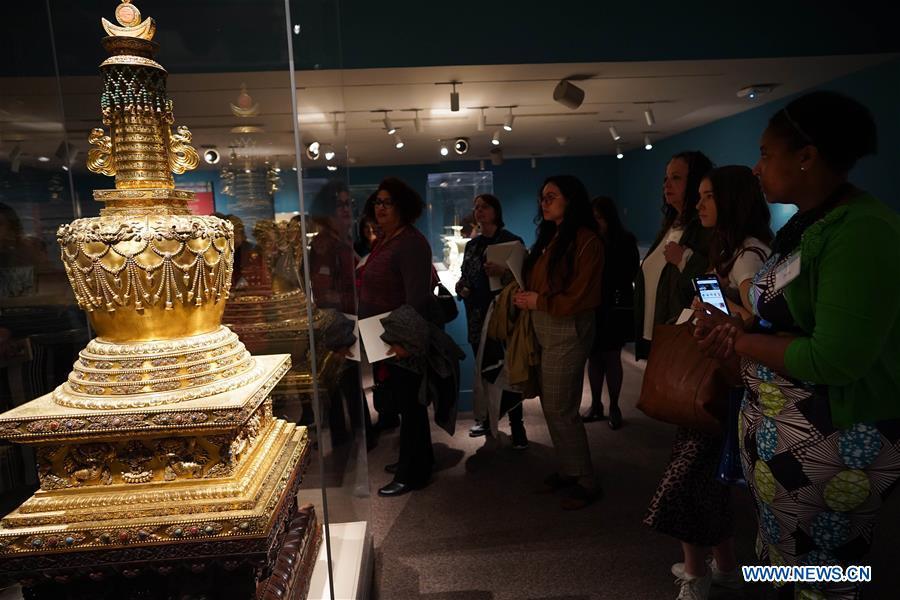 People visit the exhibition titled \