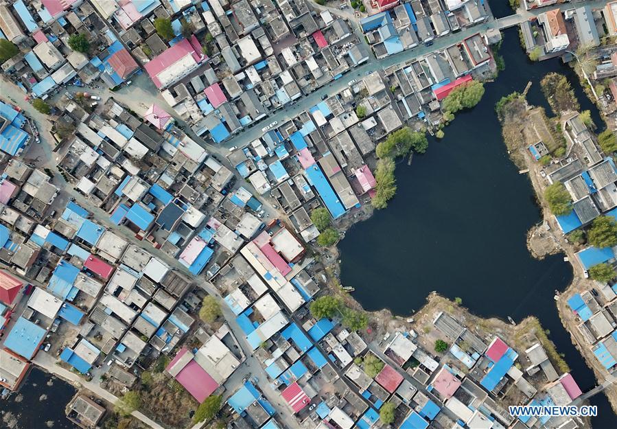 Aerial photo taken on April 10, 2019 shows the Zhaozhuangzi Village of Anxin County in Xiongan New Area, north China\'s Hebei Province. Restoration work has started in Baiyangdian Lake, northern China\'s largest freshwater body. High-pollution and energy-intensive production has been tackled. As a result, water quality has improved remarkably. (Xinhua/Mu Yu)