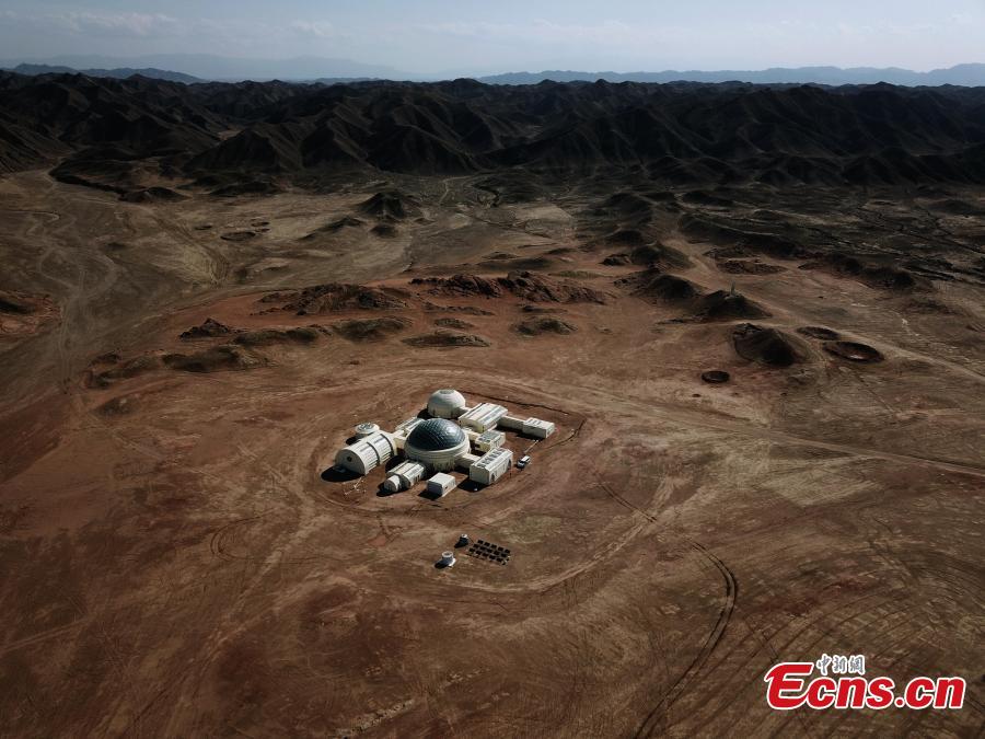 A picture taken with a drone shows an aerial view of the C-Space Project, a Mars simulation base in the Gobi Desert in Jinchang, Gansu Province, China. The C-Space Project Mars Base opened officially on 17 April 2019 with the aim to educate and provide an environment for youths and tourists to experience life on planet Mars. The base occupying an area of 11,996 square feet is situated about 40 kilometers from the town of Jinchang in the Gobi Desert. The location is chosen to simulate the landscape and harsh conditions of living on Mars as much as possible. (Photo/China News Service)
