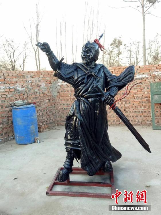 Cao Shengge shows his homemade sculptures made out of used tyres in Xingtai City, Hebei province. Cao became interested in making sculptures with tyres in 2015. He has recycled nearly 50 tons of otherwise waste tyres to create about 100 works, including mythical figures, beasts, and the twelve zodiac animals. He said the tyres usually needed to be cut into pieces and then put together to form a creation, a process that may take tens of days. Cao also said he hopes to organize an exhibition of his works and promote public awareness of environmental protection. (Photo provided to China News Service)