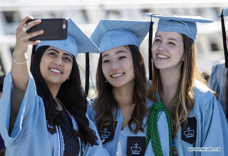 Graduate students attend Columbia University Commencement ceremony in