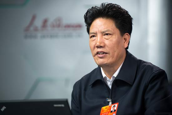 全国人大代表,西藏自治区党委副书记,西藏自治区人民政府主席洛桑江村