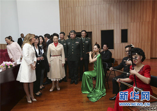 组图:彭丽媛在外交舞台的"媛style"